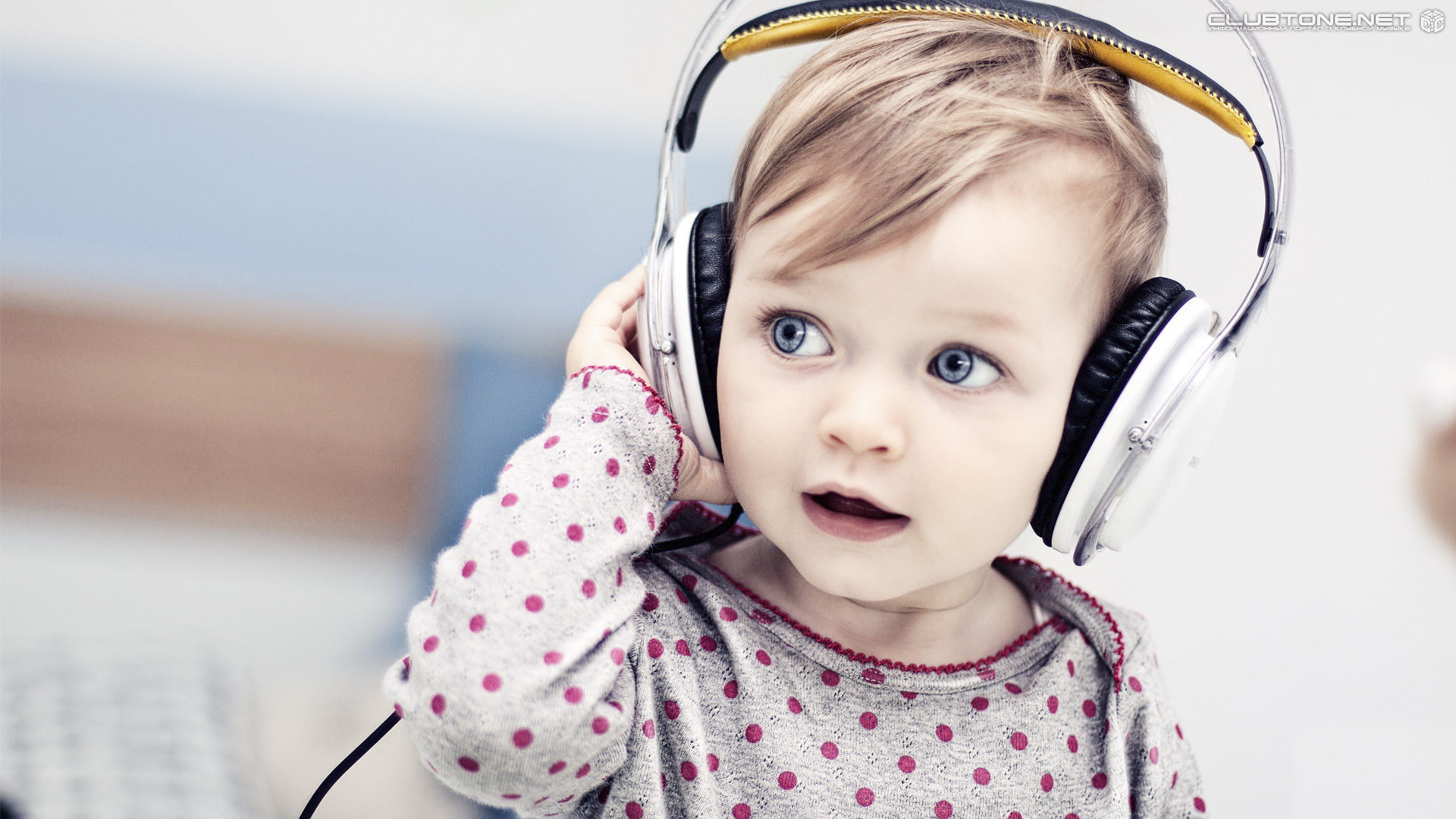 little girl with headphones  