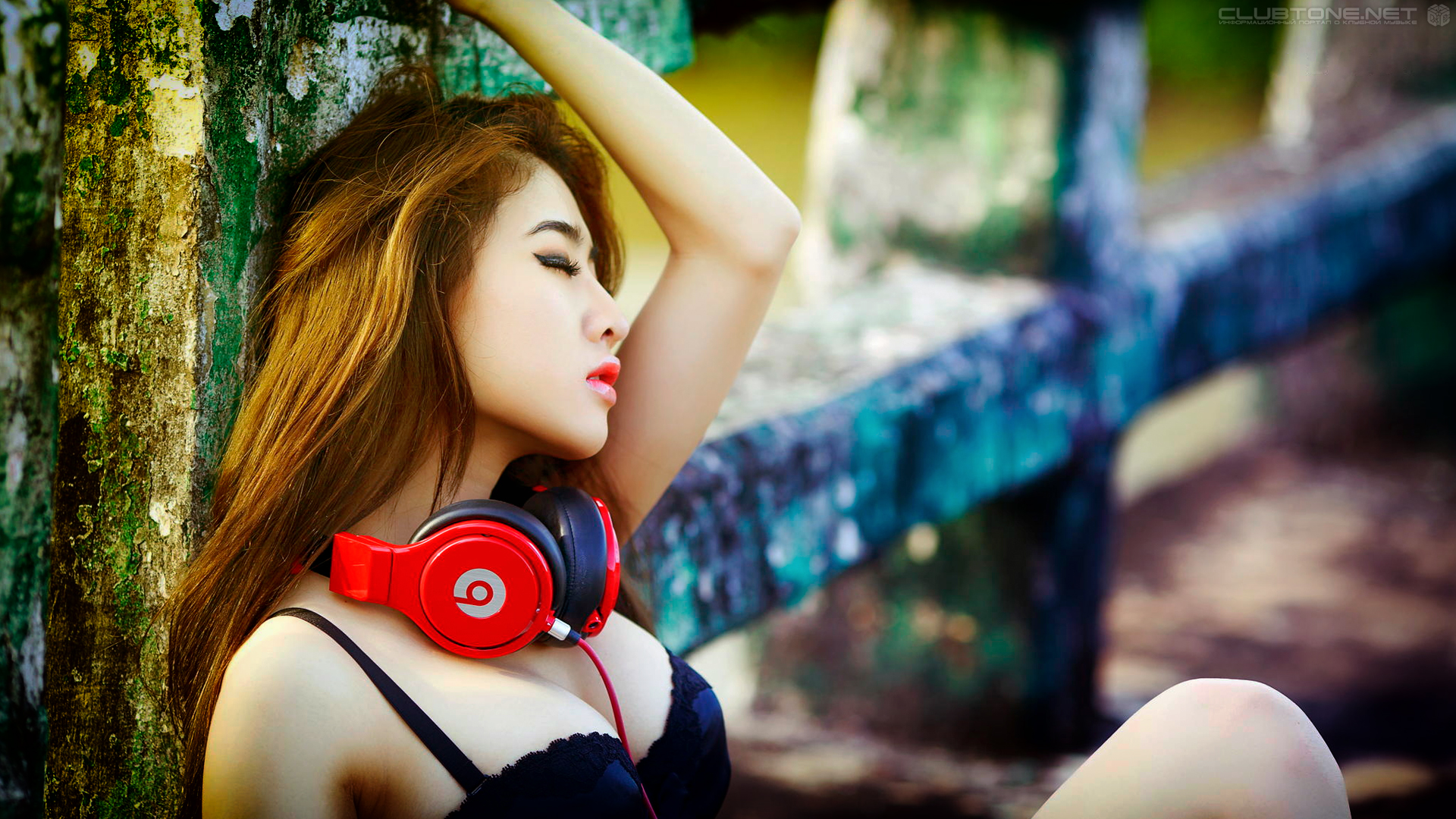 thai girl with headphones  