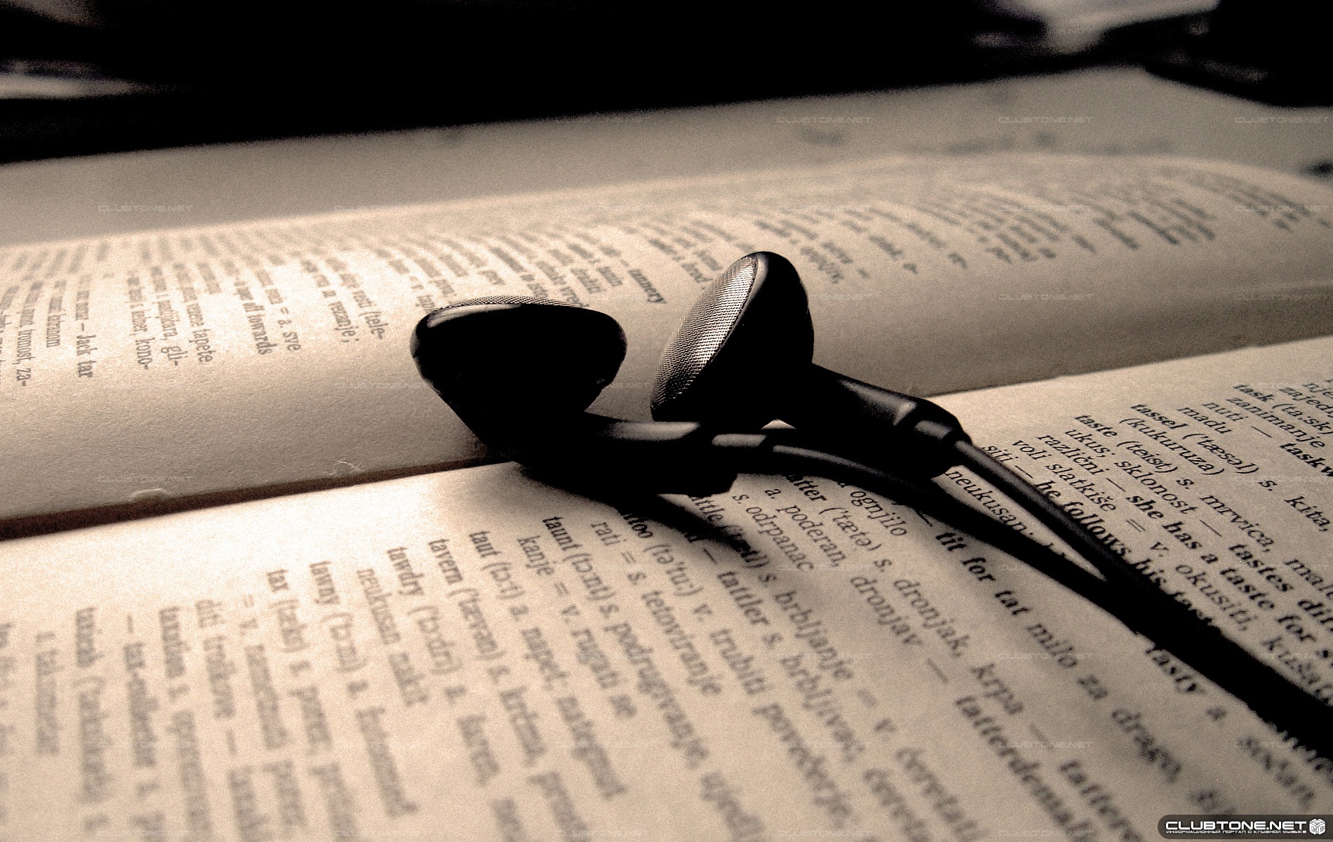 headphones on the book  